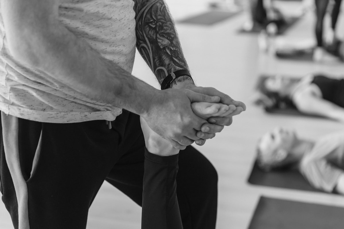 Person performing therapeutic exercise with proper form and posture